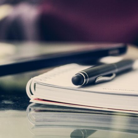 Pen on a book on a desk