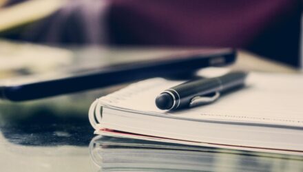 Pen on a book on a desk